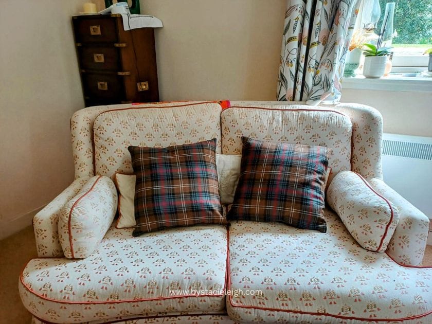 Scottish loch in autumn surrounded by gold and green trees Scotland Highlands aesthetic